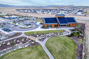Birds eye view of property with a mountain view