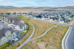 Aerial view featuring a mountain view and a residential view
