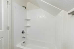 Bathroom featuring shower / tub combination