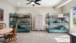 Carpeted bedroom featuring recessed lighting