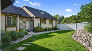 View of yard featuring a gate