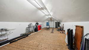 Exercise area with vaulted ceiling