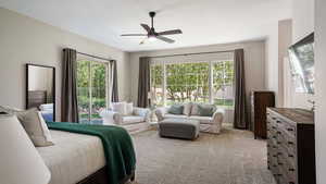 Bedroom featuring carpet and a ceiling fan