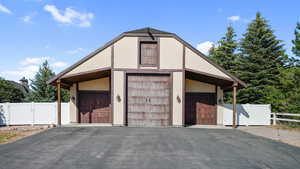 Detached garage with a gate