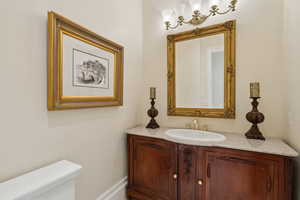 Bathroom with toilet and vanity