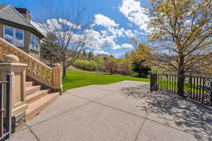 View of patio / terrace featuring stairway and a mountain view