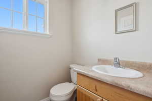 Bathroom with vanity and toilet
