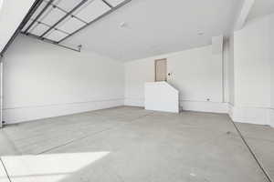 Oversized townhome garage, featuring extra width and 15' ceilings.