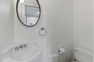 Bathroom with toilet and a sink