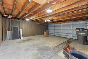 Garage featuring a garage door opener