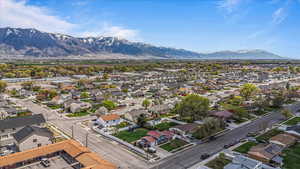 Drone / aerial view featuring a mountain view and a residential view