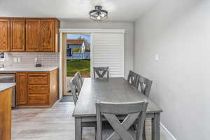 Dining space featuring light wood-style floors