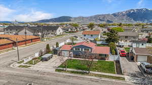Aerial view featuring a mountain view and a residential view