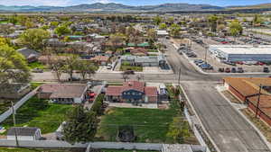 Drone / aerial view with a residential view and a mountain view