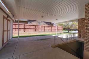 View of patio / terrace featuring fence