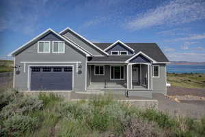 Craftsman house with covered porch and a garage