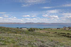 Mountain view featuring a water view