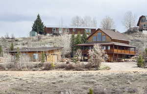 Front view of home & detached garage
