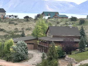 View of mountain background featuring a nearby body of water