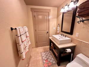 Bathroom featuring toilet and vanity