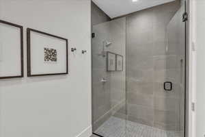 Bathroom featuring a shower stall