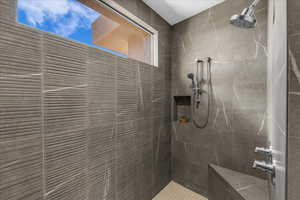 Bathroom with a tile shower