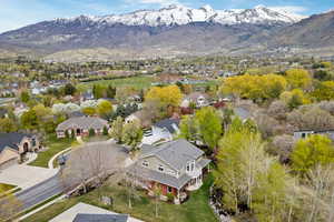 Drone / aerial view featuring a mountain view and a residential view