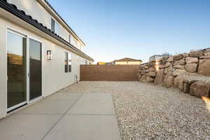 View of yard featuring a patio and a fenced backyard