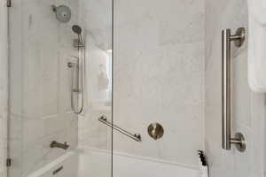 Bathroom featuring walk in shower