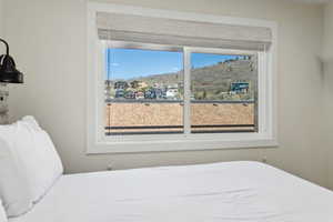 Bedroom with multiple windows