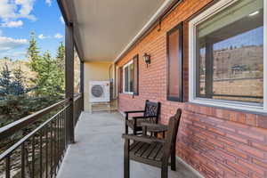 Balcony featuring ac unit