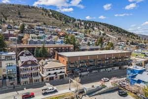 Birds eye view of property featuring a mountain view