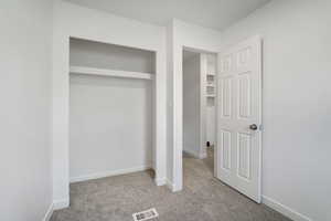 Closet featuring visible vents