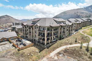 Aerial view featuring a mountain view and a residential view