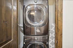 Clothes washing area with stacked washer / drying machine and laundry area