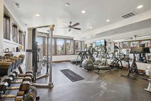 Workout area with visible vents, a ceiling fan, and recessed lighting