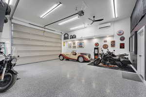 Detached Garage with a garage door opener and a wall unit AC