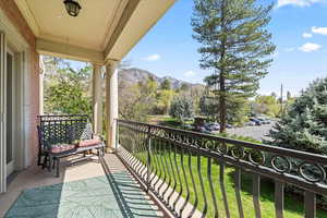 Balcony with a mountain view and a porch