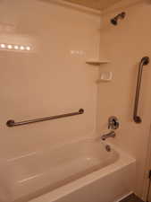 Full tub/shower with grab bars