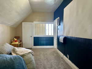 Fun family room with lofted ceiling and baseboards