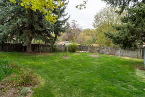 View of yard featuring a fenced backyard
