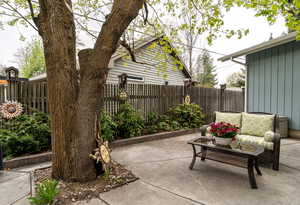 View of patio / terrace featuring fence private yard and an outdoor hangout area