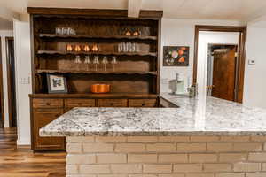 Bar featuring wood finished floors