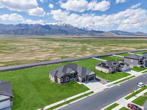 Drone / aerial view featuring a mountain view and a rural view