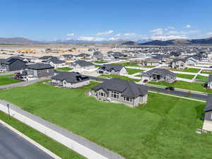Drone / aerial view with a mountain view and a residential view