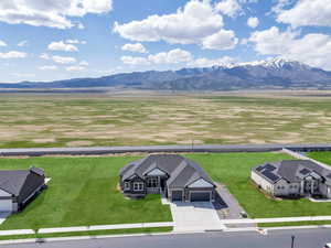 Drone / aerial view featuring a mountain view and a rural view