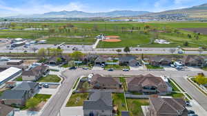 Aerial view featuring a mountain view and a residential view