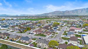 Birds eye view of property featuring a residential view and a mountain view
