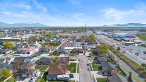Aerial view featuring a residential view and a mountain view