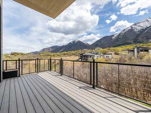 Primary bedroom's private deck featuring mountain views